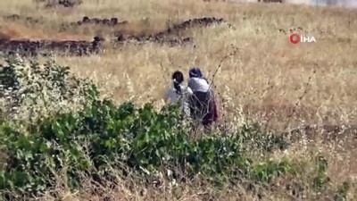 gokyuzu -  Devasa yangını elbiseleri ile söndürmeye çalıştılar Videosu