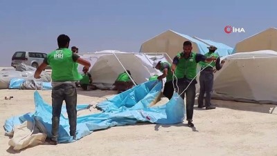 yardim malzemesi -  - İHH ve BM’den İdlib’e Yeni Kamp
- İHH İnsani Yardım Vakfı İle Birleşmiş Milletler Tarafından Suriye’nin İdlib Kırsalındaki Tur Laha Köyüne 400 Çadırlık Yeni Bir Kamp Kuruldu  Videosu