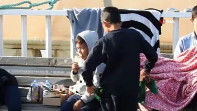 hamile kadin -  Çeşme'de 266 düzensiz göçmen ve iki organizatör zanlısı yakalandı  Videosu