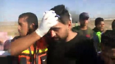 mermi - İsrail AA muhabirini 4 defa yaraladı - GAZZE  Videosu