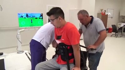 yurume robotu -  Omuriliği kırıldı, felç oldu, pes etmedi ayağa kalktı  Videosu