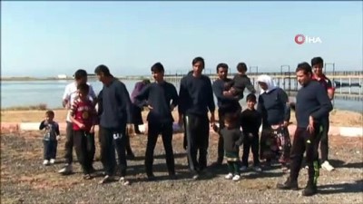 kacak multeci -  Yunan karasularında yakalanan 18 kaçak mülteci Türkiye'ye teslim edildi  Videosu