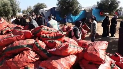 rejim -  - Azez'de Suriyelilere kış yardımı  Videosu