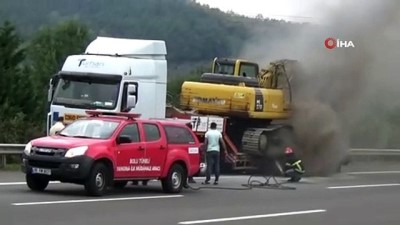 kamyoncular -  İş makinesi yüklü tırın lastikleri alev aldı Videosu