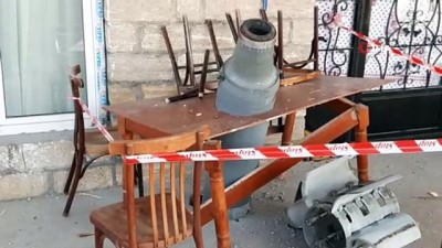 savas sucu -  - Ermenistan'ın Terter'e attığı roketler masaya ve bahçeye saplanarak patlamadı Videosu