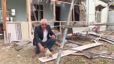 uzun menzilli fuze - Ermenistan'ın füze saldırısında isabet alan evinin enkazından ailesini elleriyle kazıyarak kurtardı Videosu