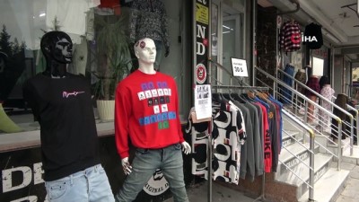 giyim magazasi -  Hırsızın fotoğrafını afiş yapıp dükkanına astı Videosu