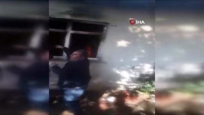  Soba kurarken evini yaktı