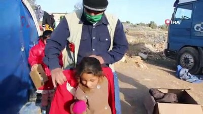  - Suriye’de 4 bin çocuğa mont ve çizme dağıtıldı