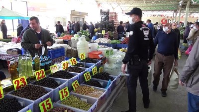  Pazarda polis ile maske polemiği: 'Bak ben de jandarmayım'