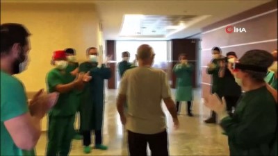  Kovid-19'u yenen doktoru mesai arkadaşları alkışlarla taburcu etti