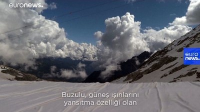 kuresel isinma - İtalya'da küresel ısınmaya karşı buzulları korumak için brandalı çözüm Videosu
