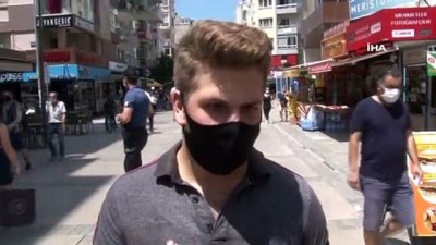  İzmir'deki denetimlerde polisi gören maskesini düzeltti