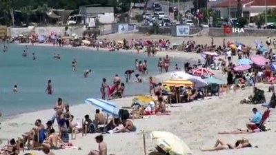 local -  Kısıtlama kalktı, İzmir’de plajlar doldu Videosu