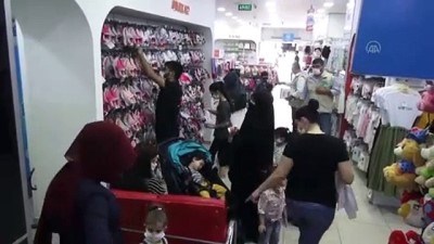 giyim magazasi - Yetim çocuklara bayramlık hediye edildi - BATMAN Videosu