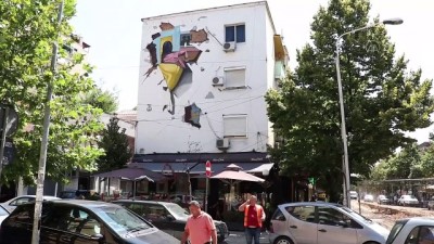 sokak sanati - Arnavutluk'ta genç sanatçı Tiran duvarlarını resimleriyle süslüyor - TİRAN Videosu