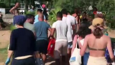 golgeli -  Plajda yürüyen genç kadın aşırı sıcaktan fenalaştı, imdadına sağlık çalışanları yetişti Videosu
