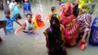 muson yagmurlari -  - Sel suları mutluluklarına engel olamadı
- Bel seviyesindeki sel suları içinde kına yaptılar Videosu