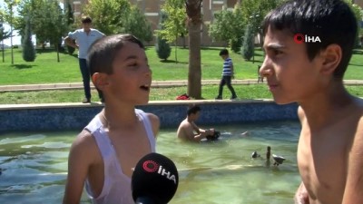 hava sicakliklari -  Şanlıurfa kavruluyor... Çocuklar süs havuzlarında serinledi Videosu