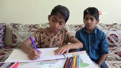 isitme engelli -  Renkli gözlere sahip Nurcan, hayalleri için çiziyor Videosu