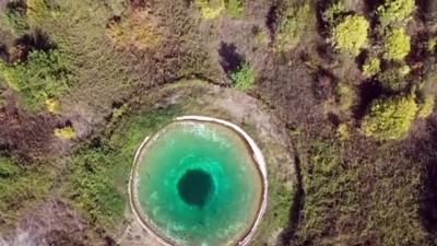 (DRONE) Amanos Dağlarının 'nazar boncuğu' görünümlü yangın göleti ziyaretçilerini büyülüyor - HATAY