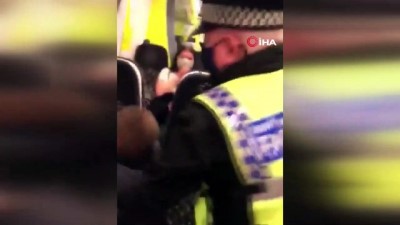 polis siddeti -  - İngiltere’de trende maske takmayan yolcuya polis şiddeti Videosu