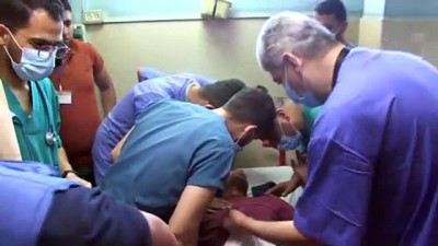 roket saldirisi - GAZZE - Anadolu Ajansı kameramanı Muhammed Dahlan İsrail'in Gazze'ye düzenlediği saldırıda yaralandı (2) Videosu