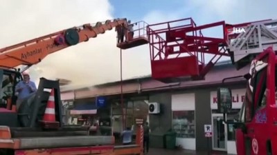  9 dükkanı etkileyen yangın söndürüldü