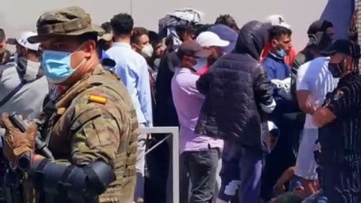 diplomat - CEUTA - Fas'tan İspanya'ya geçen düzensiz göçmenlerin bekleyişi sürüyor (2) Videosu