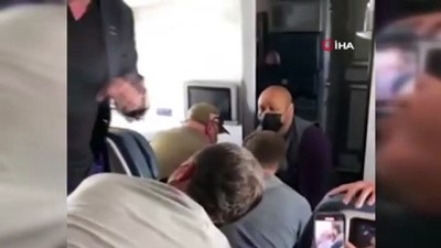 yolcu ucagi -  - ABD'de uçağın kokpitine girmeye çalışan yolcu gözaltına alındı Videosu