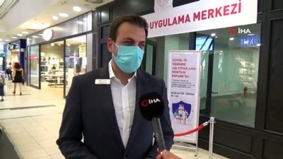 alisveris merkezi -  Alışveriş merkezinde gezerken aşı yaptırıyorlar Videosu