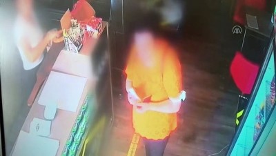 İZMİR - Satırla girdiği börekçiye zarar veren kişi güvenlik kamerasında