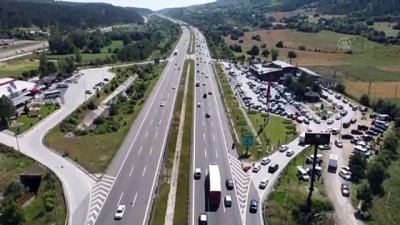 emniyet seridi - BOLU - Anadolu Otoyolu'nda bayram tatili yoğunluğu devam ediyor Videosu