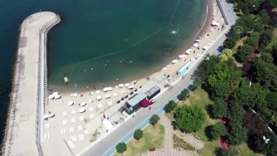 İSTANBUL - (DRONE) Güzel havayı değerlendiren vatandaşlar, Caddebostan sahilinde denize girdi