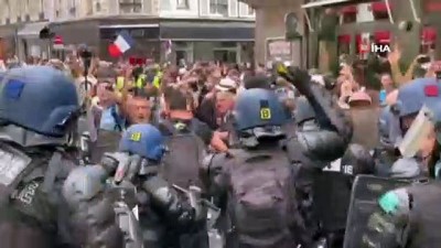 protesto -  - Fransa’da aşı karşıtları ve polis arasında arbede
- Polisten protestoculara gazlı müdahale Videosu