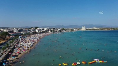 turist - AYDIN - Sıcak hava dolayısıyla Kuşadası ve Didim sahillerinde yoğunluk oluştu Videosu